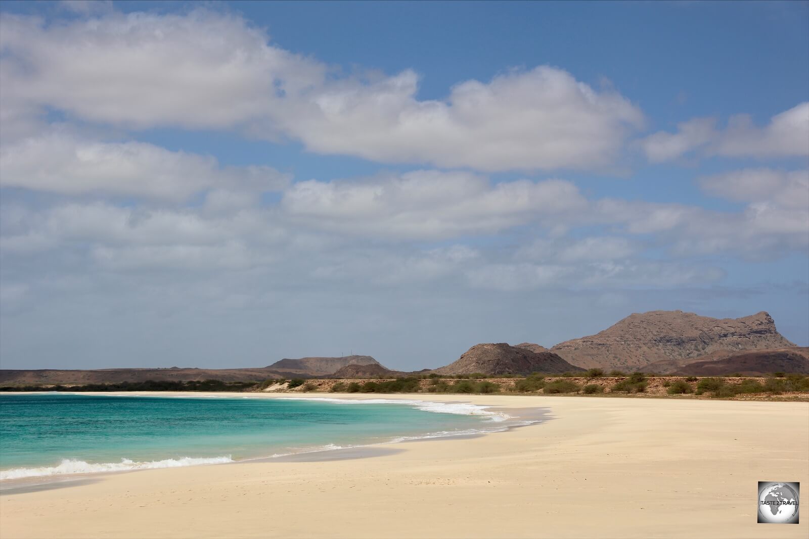 A long, rough gravel road leads to the Santa Monica beach which exists in splendid isolation.