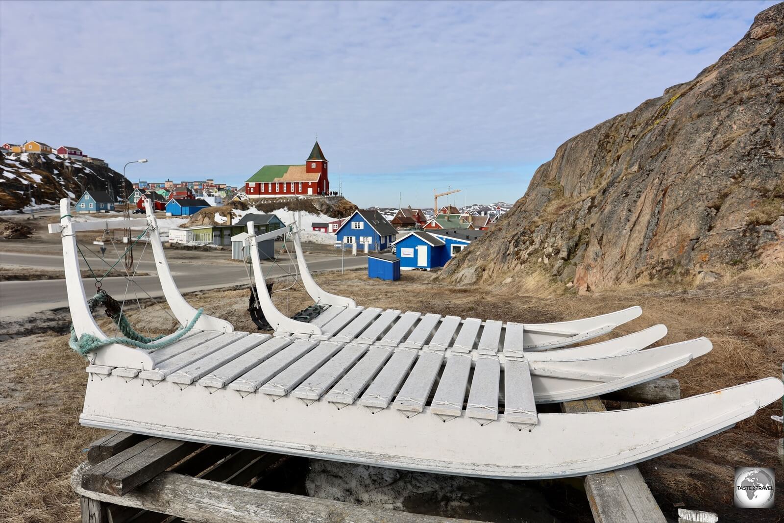 Sleds, parked on the side of the road in Sisimiut. 