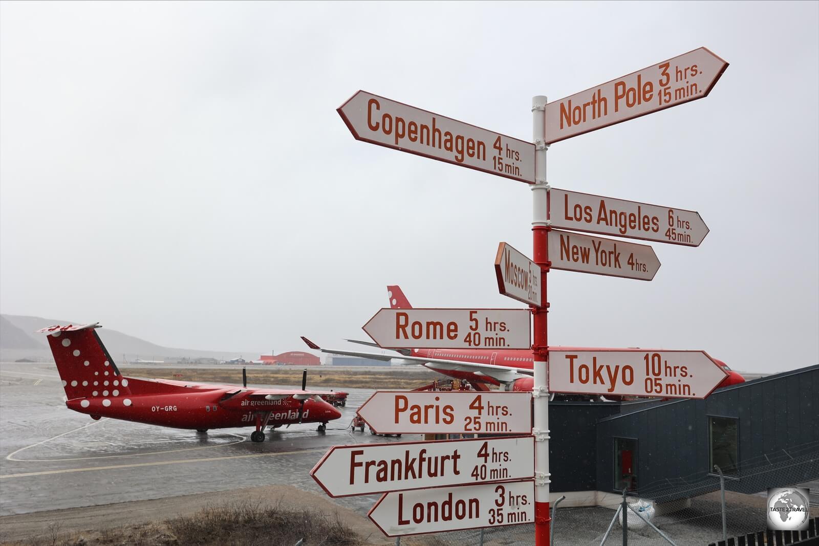 A distance sign at Kangerlussuaq Airport. 