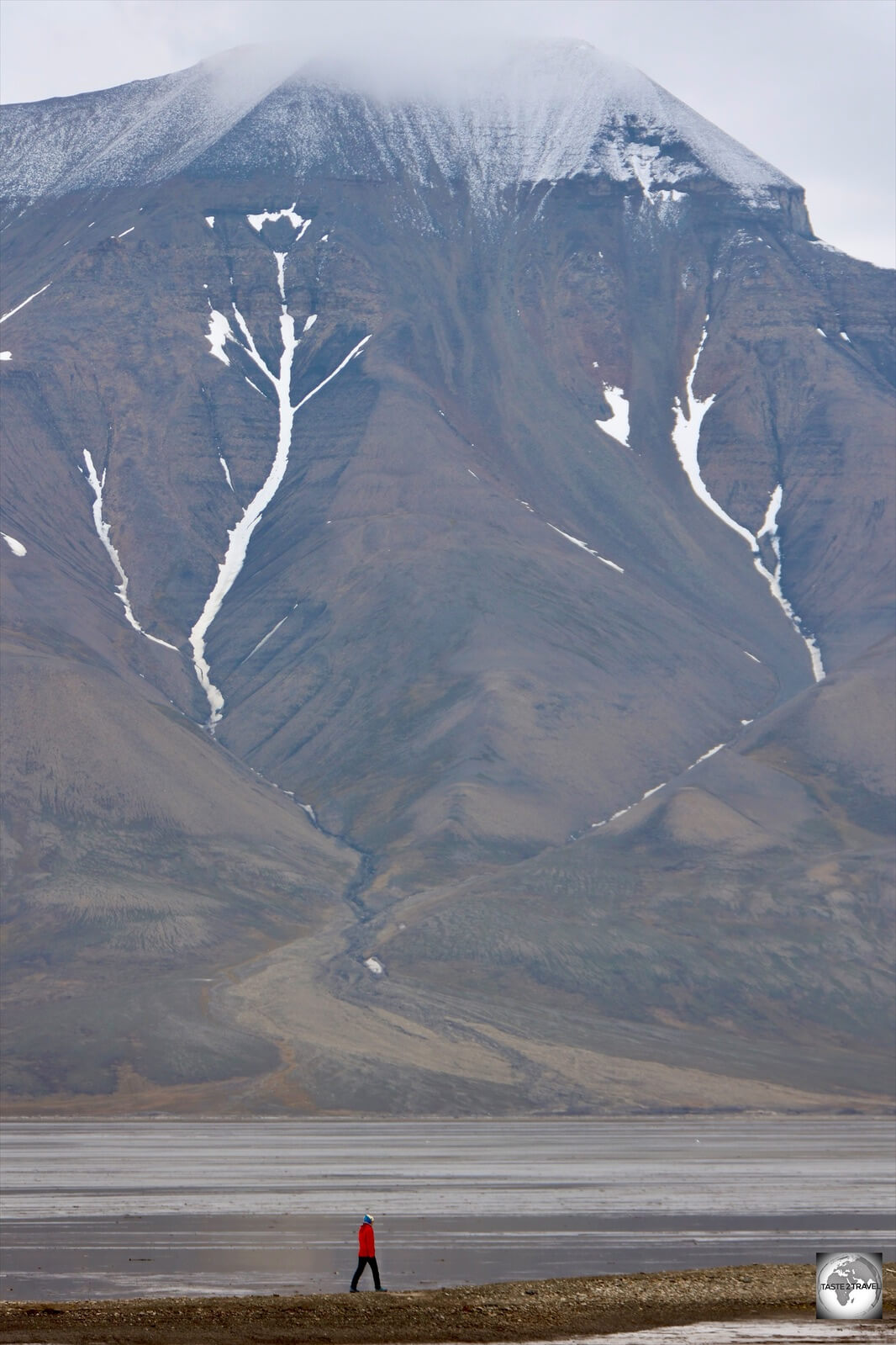 Mountain peaks surround the settlement of Longyearbyen.