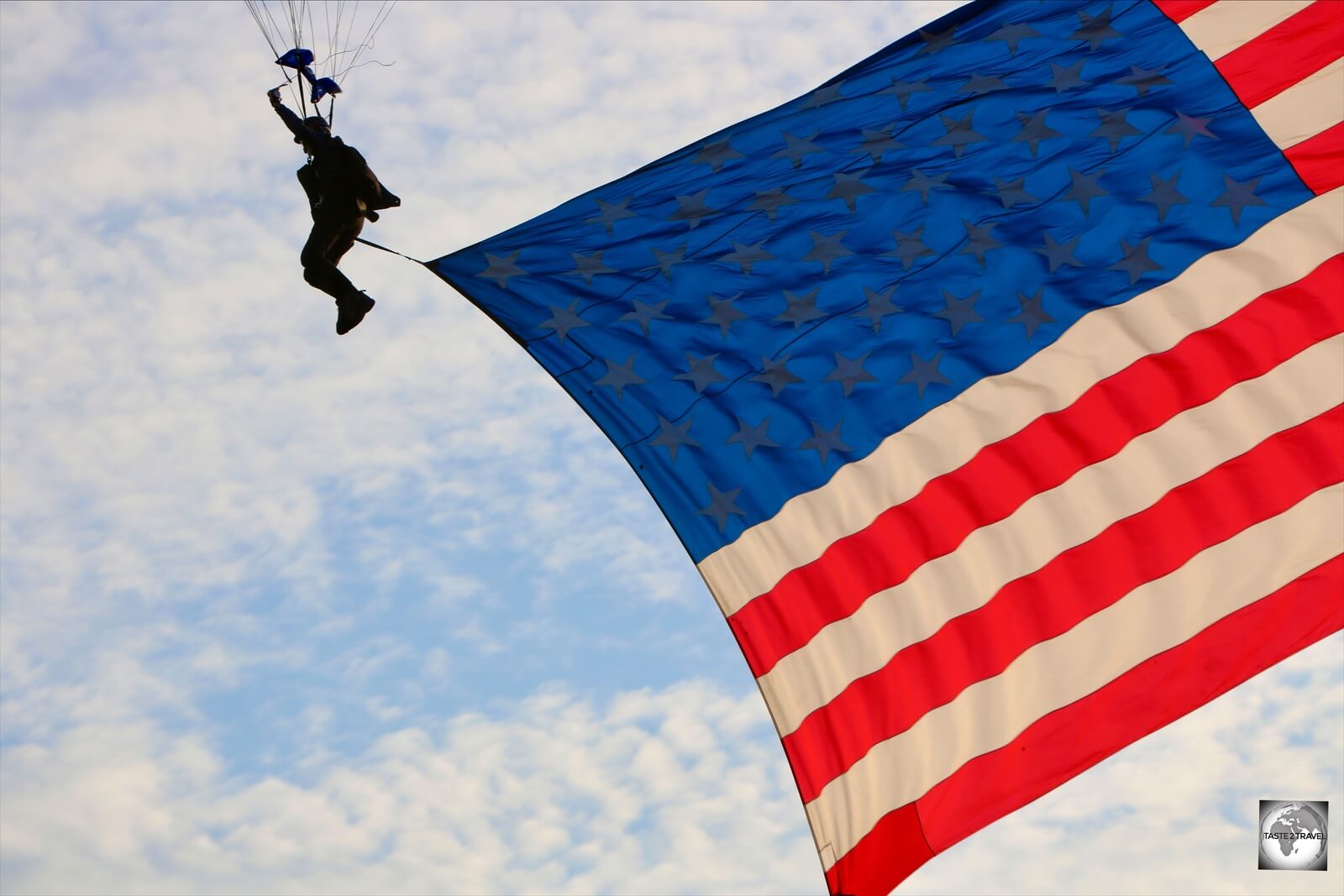 Parachuter with USA flag, Paso Robles State Fair, California