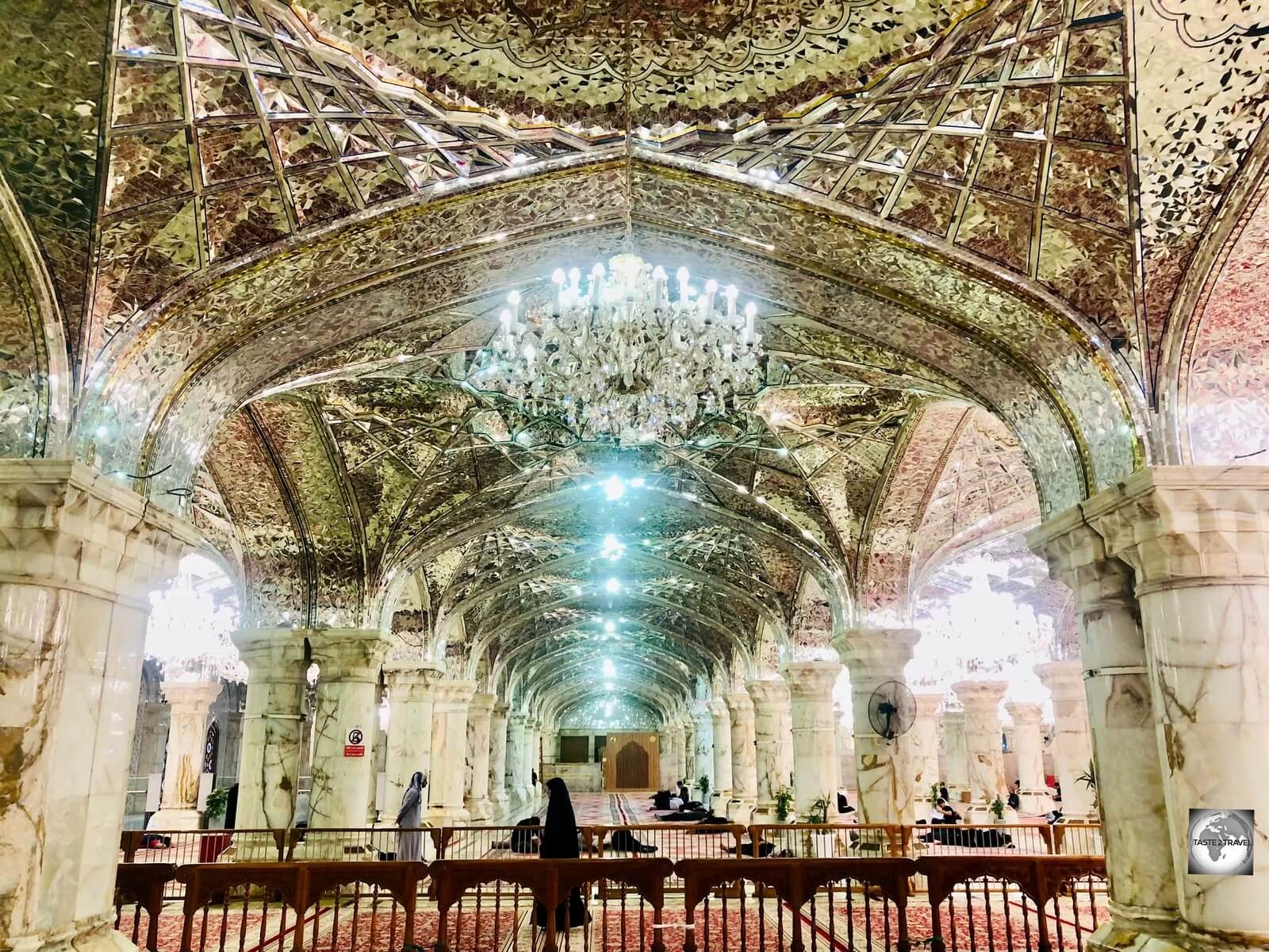 The interior of the Imam Ali Shrine features large prayer halls, carpeted with the finest of Iranian silk carpets. 