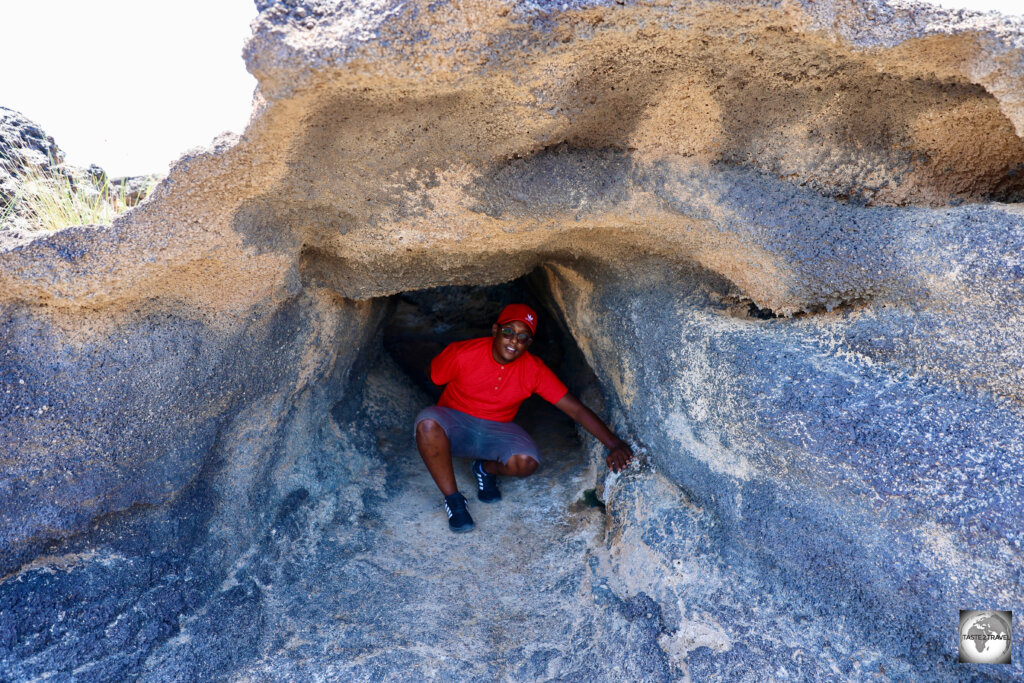 My Guide, Akram, exploring one of the small lava tunnels near Lake Assal.