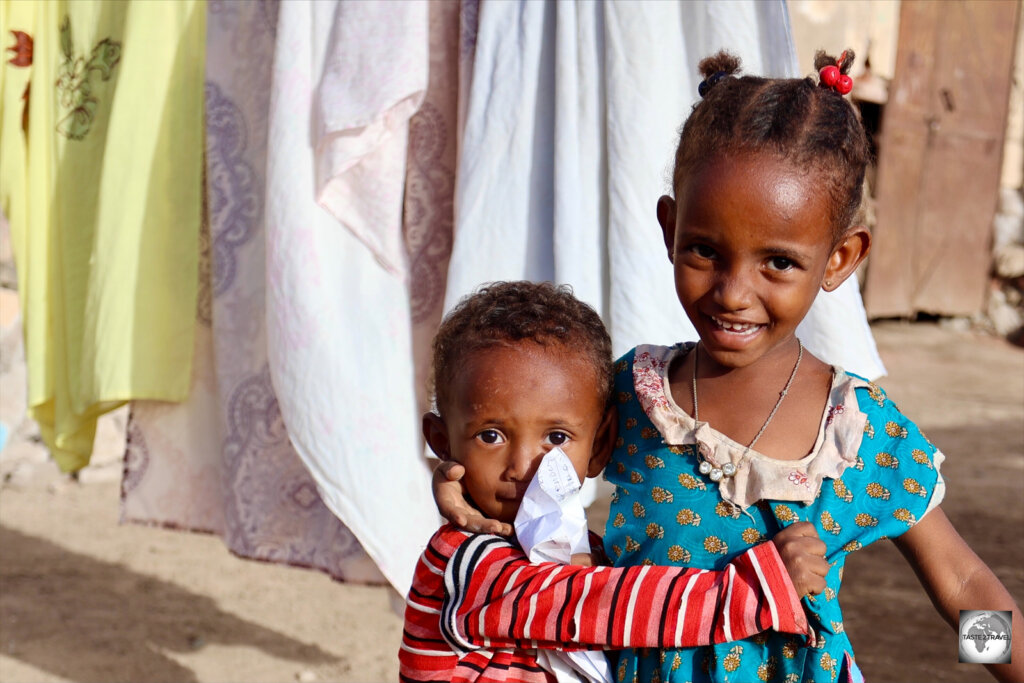 Children, living among the ruined buildings in Massawa old town.