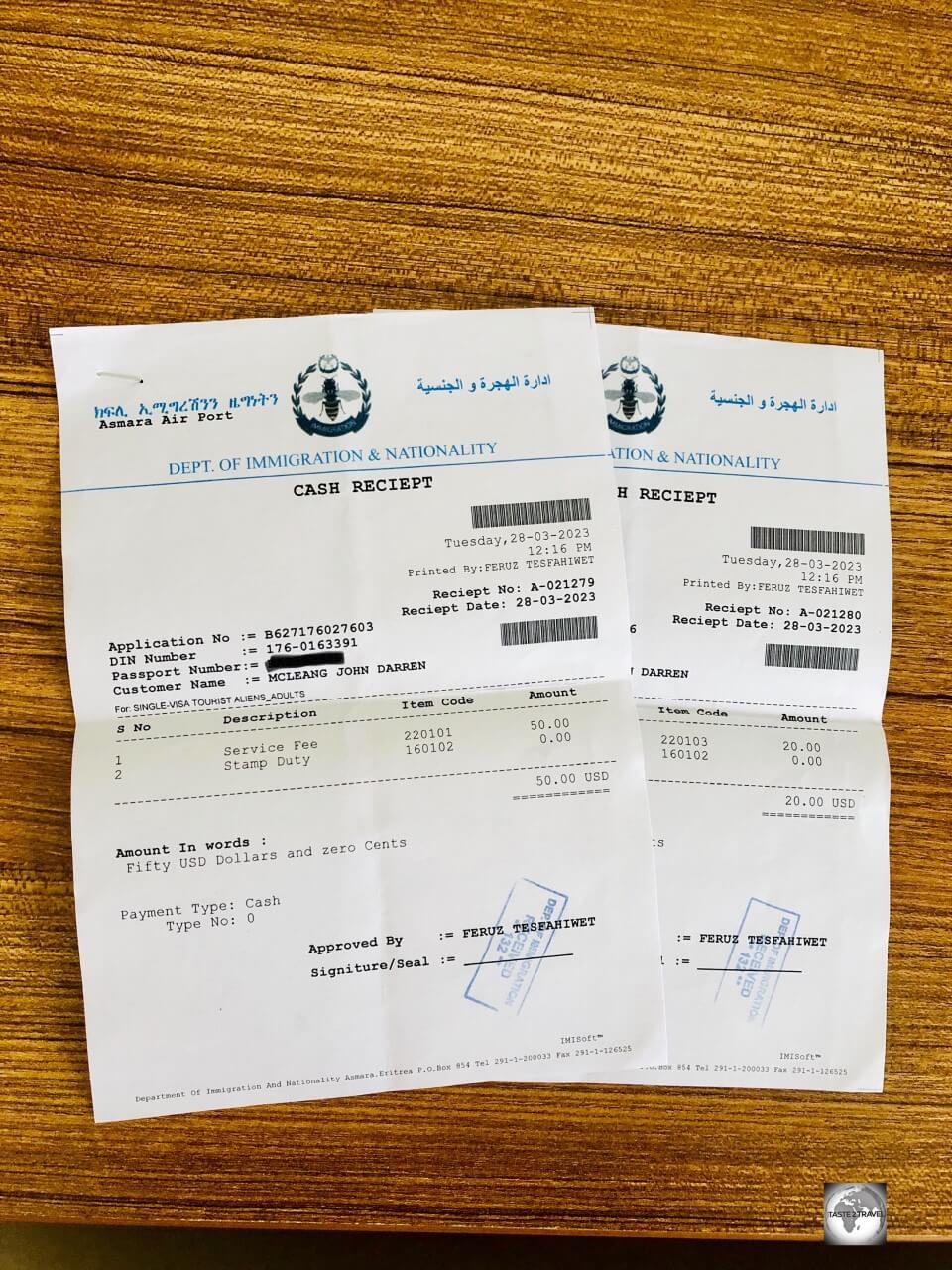 Two identical visa receipts, which total US$70.