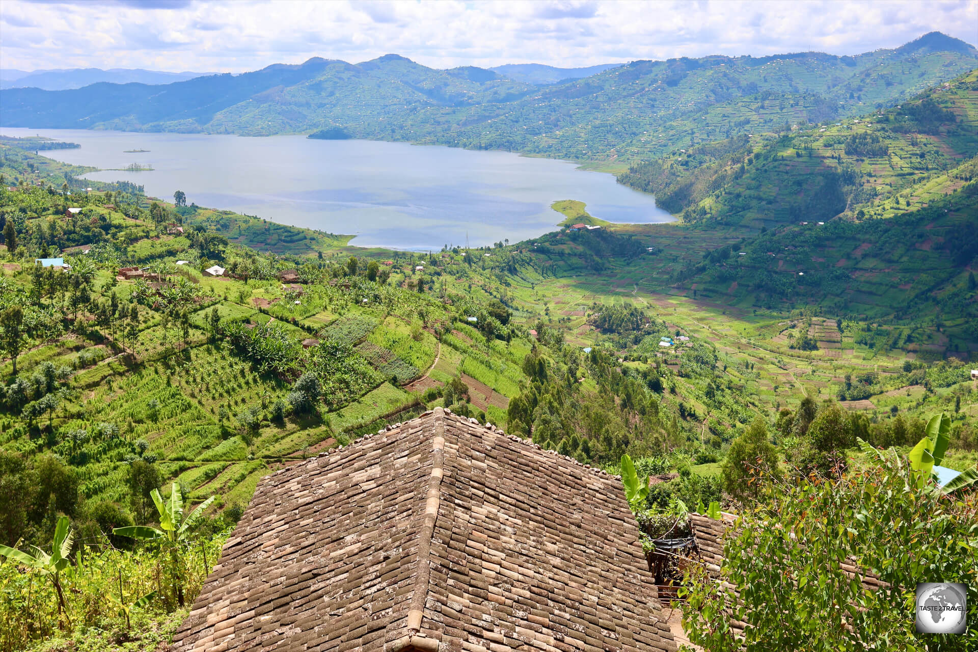 A panoramic view of Lake Ruhondo, from the gravel road which runs along the top of a ridge, high above the lake. 