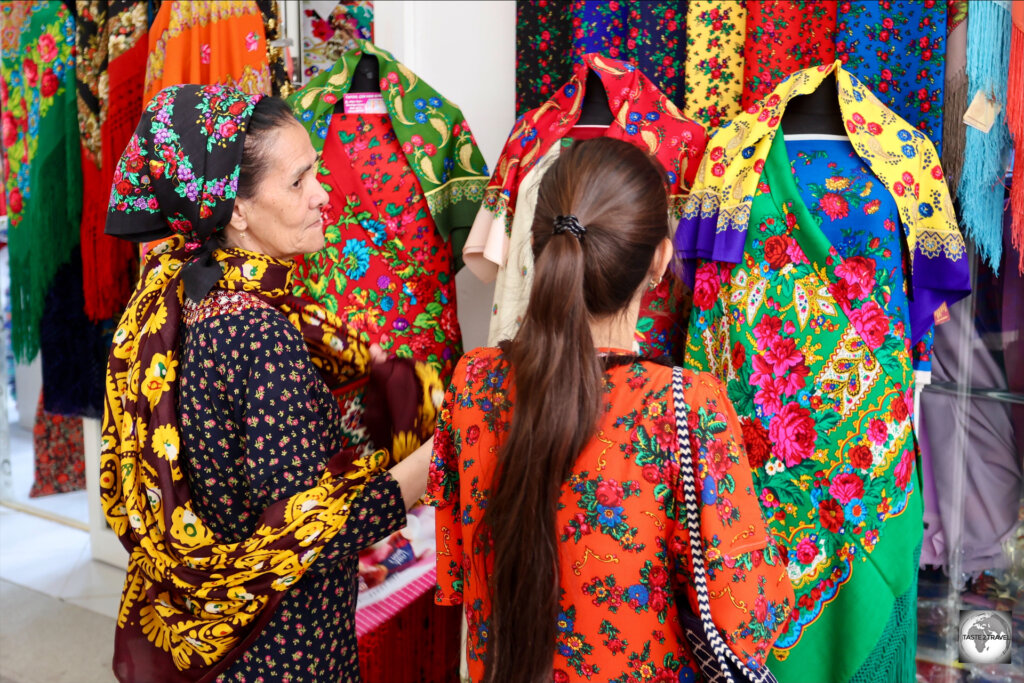 As a sign of marital status, married Turkmen women typically wear a head scarf, while single girls do not!