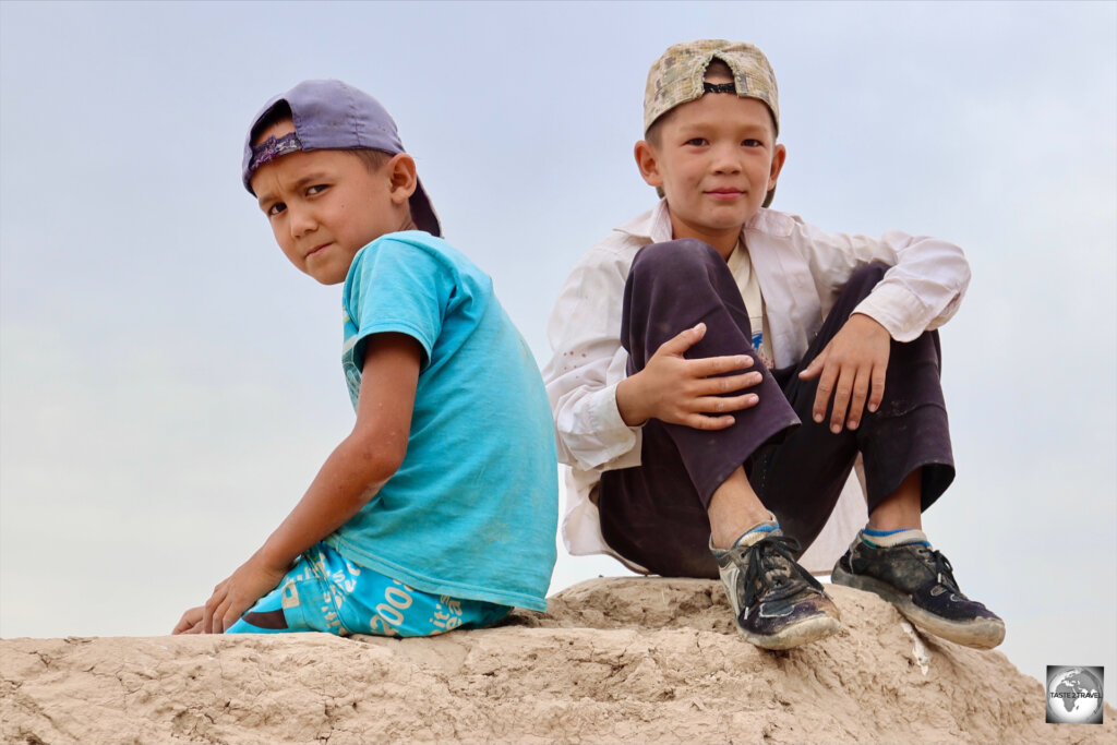 Two Turkmen boys, relaxing at the UNESCO World Heritage Site of Merv.