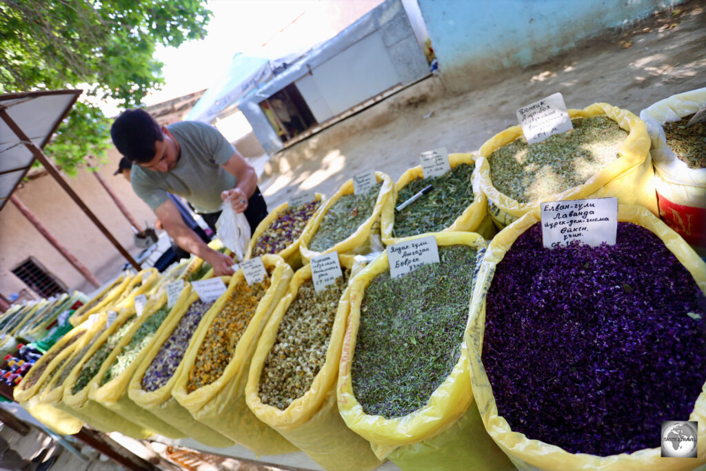 A tea seller, selling his herbal teas, under the shade of the giant plane tree in Nokhur village.