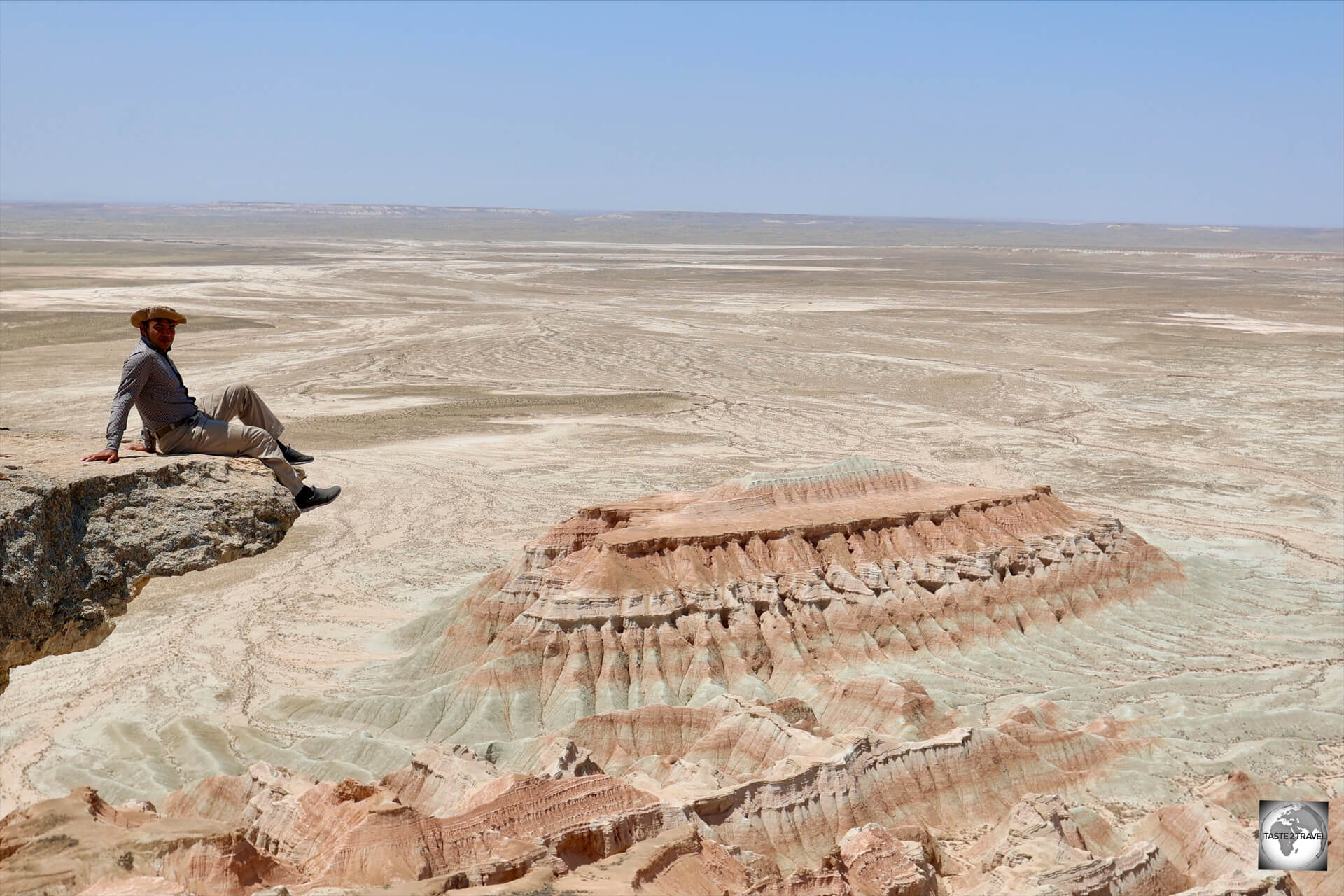 My driver Rejep, enjoying the panoramic view at Yangykala Canyon. 