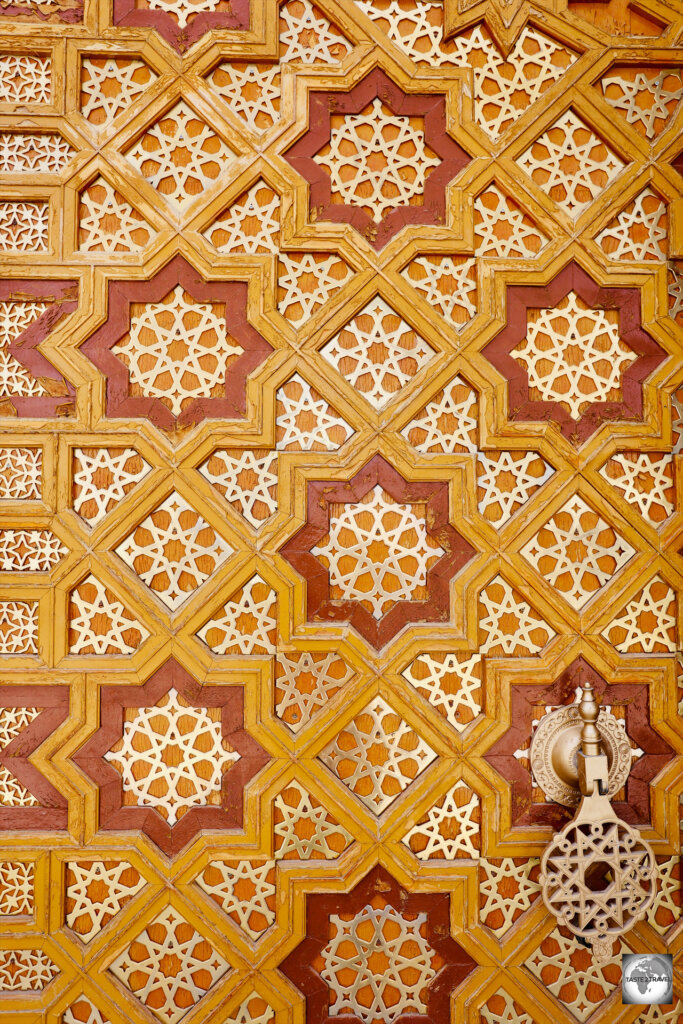 Detail view of the main entrance door of the Turkmenbashi Ruhy Mosque.