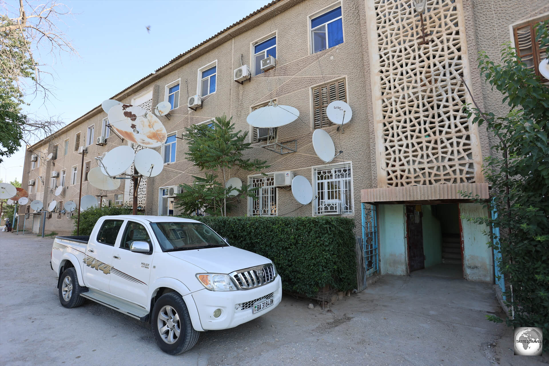 Satellite dishes galore! A view of the Soviet-era apartment building in Balkanabat, where my driver/ guide Rejep lives with his extended family.