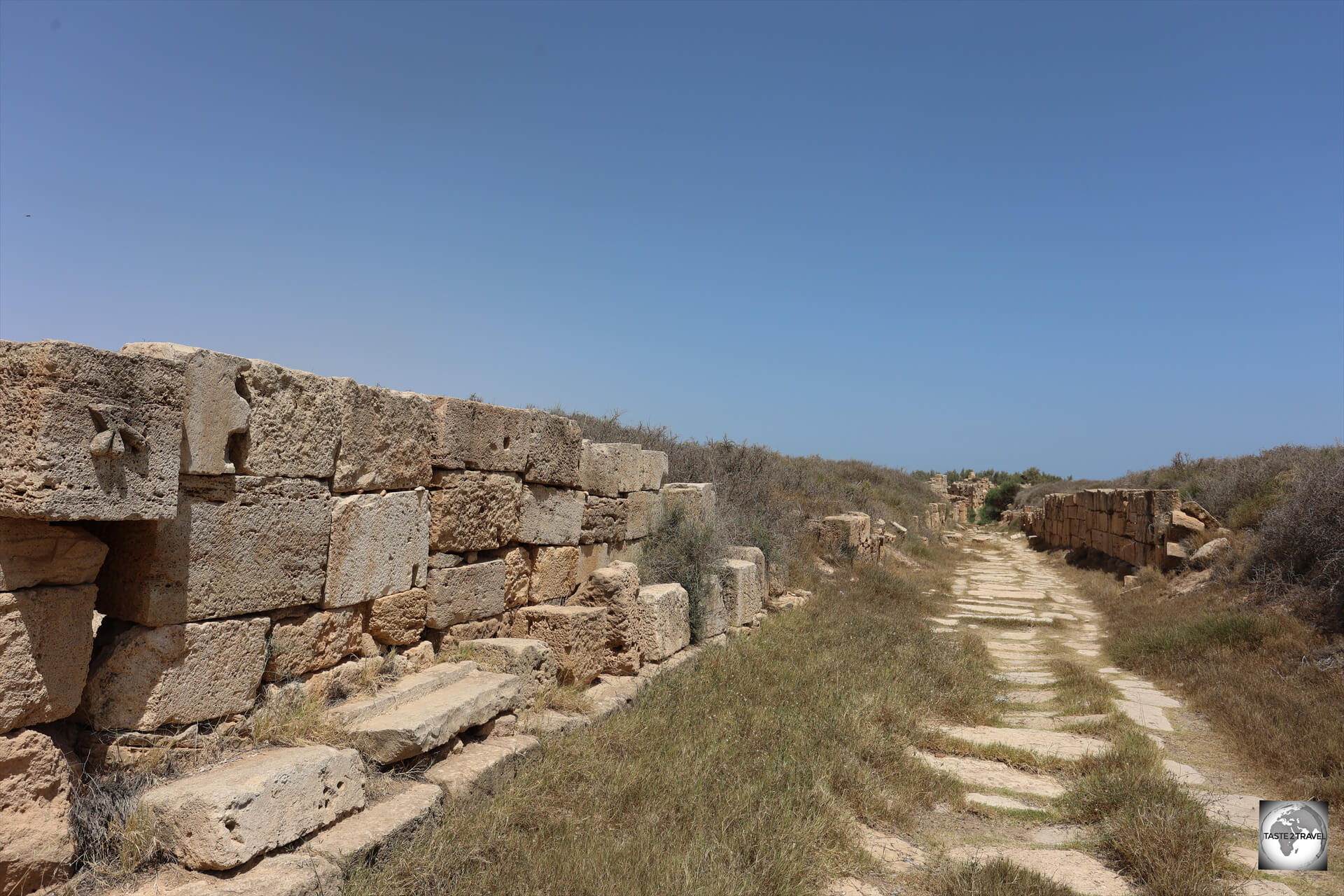 If only these buildings could talk! A view of Brothel Street at Sabratha, with the penis indicator on the left.