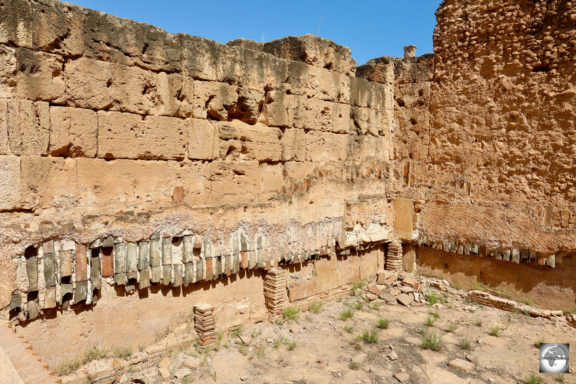 A view of the steam room at the Baths of Hadrian at Leptis Magna, which shows terracotta pipes still attached to the walls.