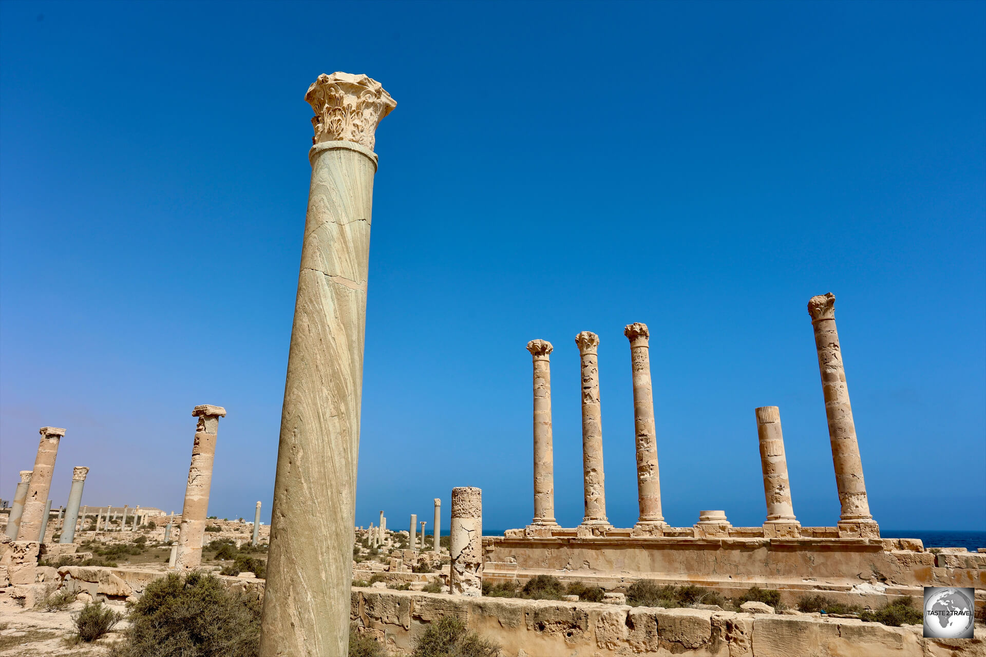 A distant view of the columns of the Antonine temple at Sabratha, Libya.