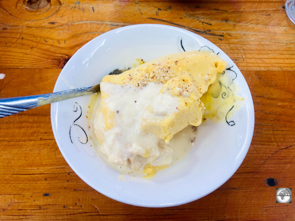 A plate of divine, Sheer Yakh, made from fresh mangoes, served in an ice cream shop in Mazar.