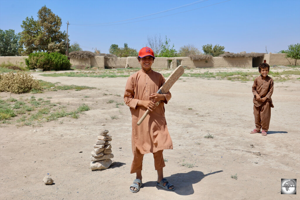 Afghan boys playing cricket in Balkh.