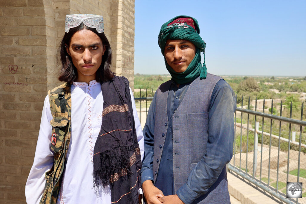 Two Afghan men, exploring the ancient city walls in the town of Balkh,