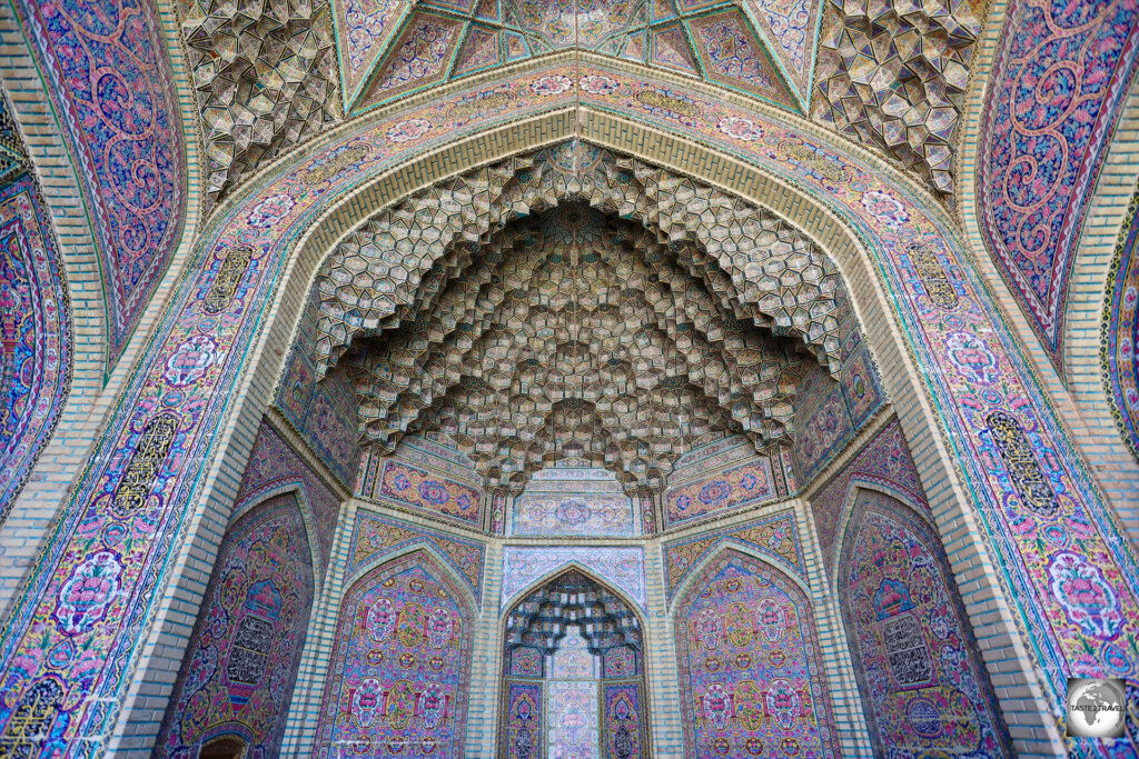 A view of a Muqarna, surrounded by a sea of pretty pink tiles, at the Nasir al-Mulk Mosque in Shiraz.