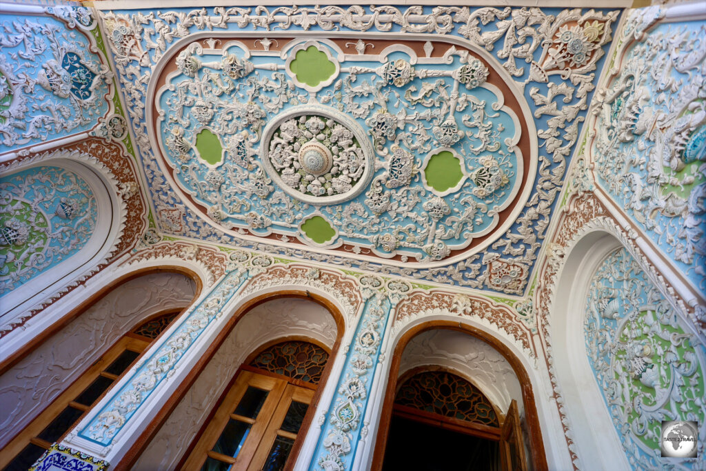 A porch at Qavam House features a profusion of plaster stucco work.