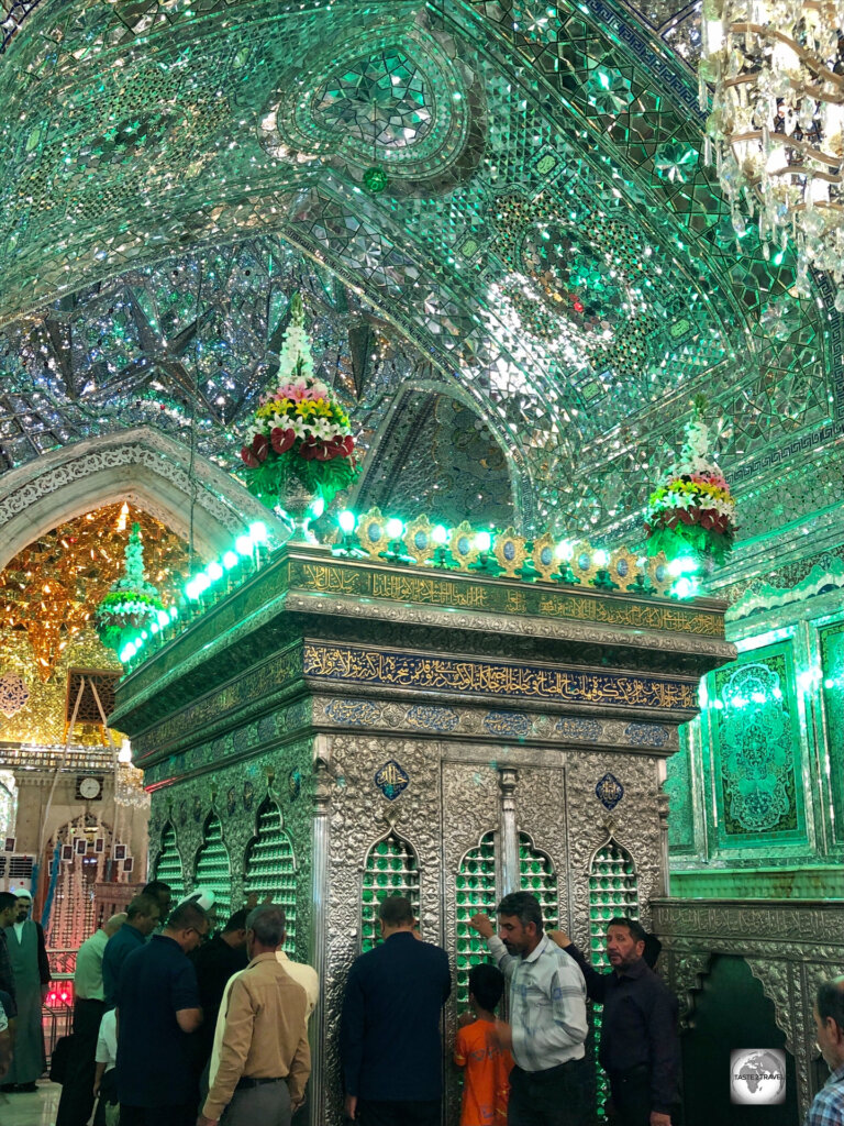 Worshippers praying at the Tomb of Sayyid Ahmad, inside the Shahcheragh Shrine.