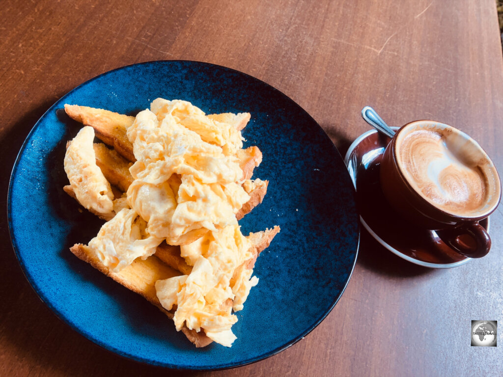 Scrambled eggs and coffee at the Crazy Uga cafe in Alofi.