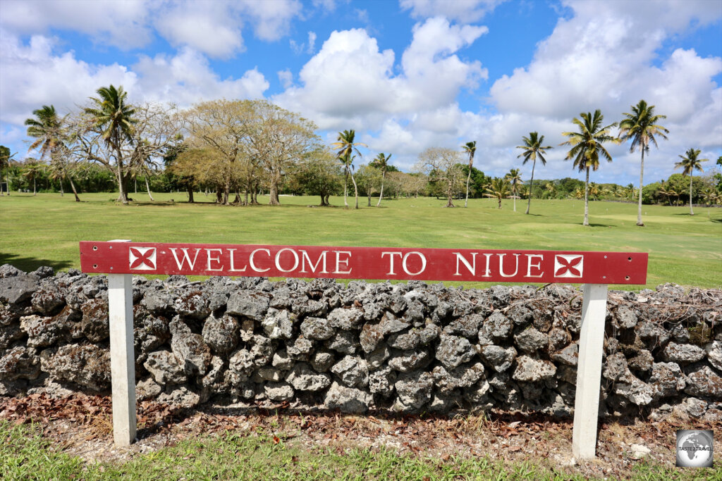 A 'Welcome to Niue' sign, outside Niue International Airport.