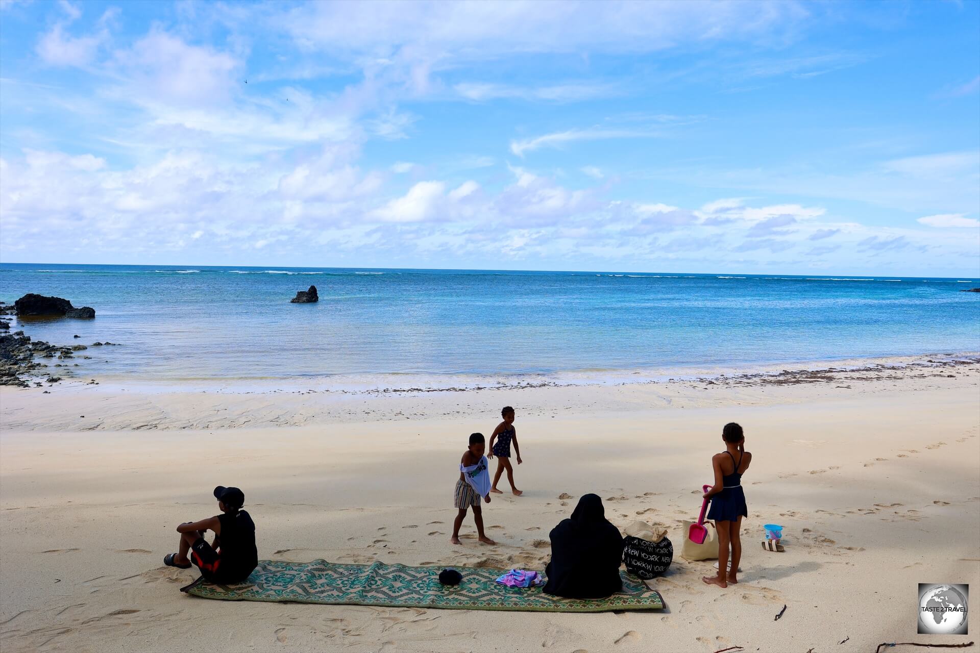 A Comoran family, enjoying a day out at Mitsamiouli Beach.