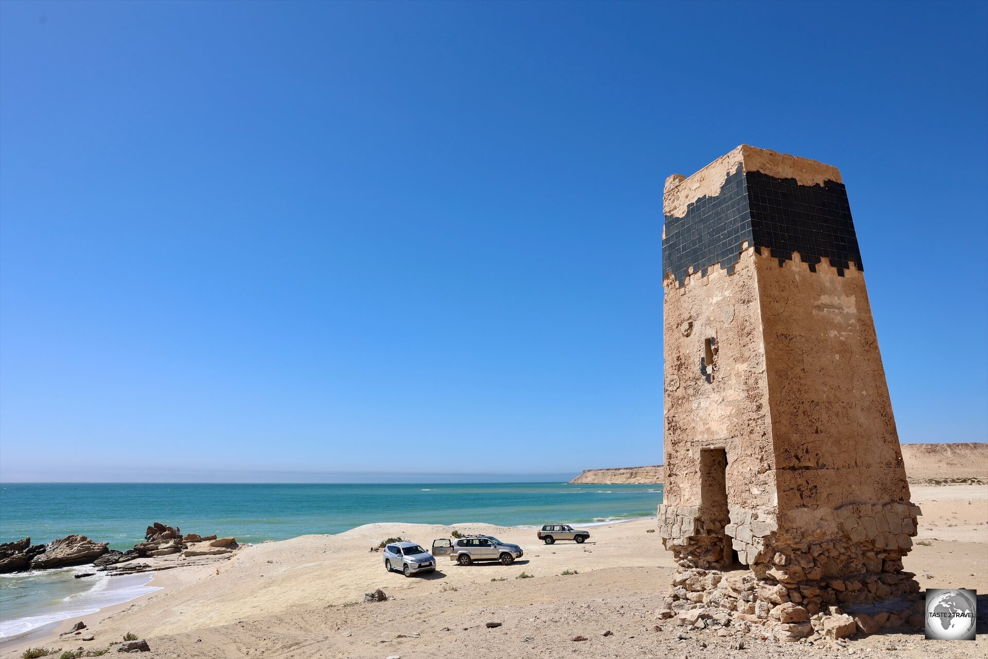 An abandoned Spanish-era lighthouse overlooks Porto Rico Beach. 