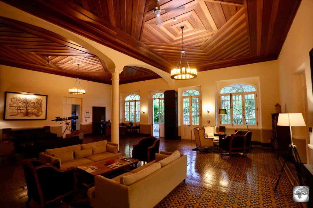 A view of the beautiful ceiling, which is made from local marapião wood, and the reception area at Hotel Roça Sundy.