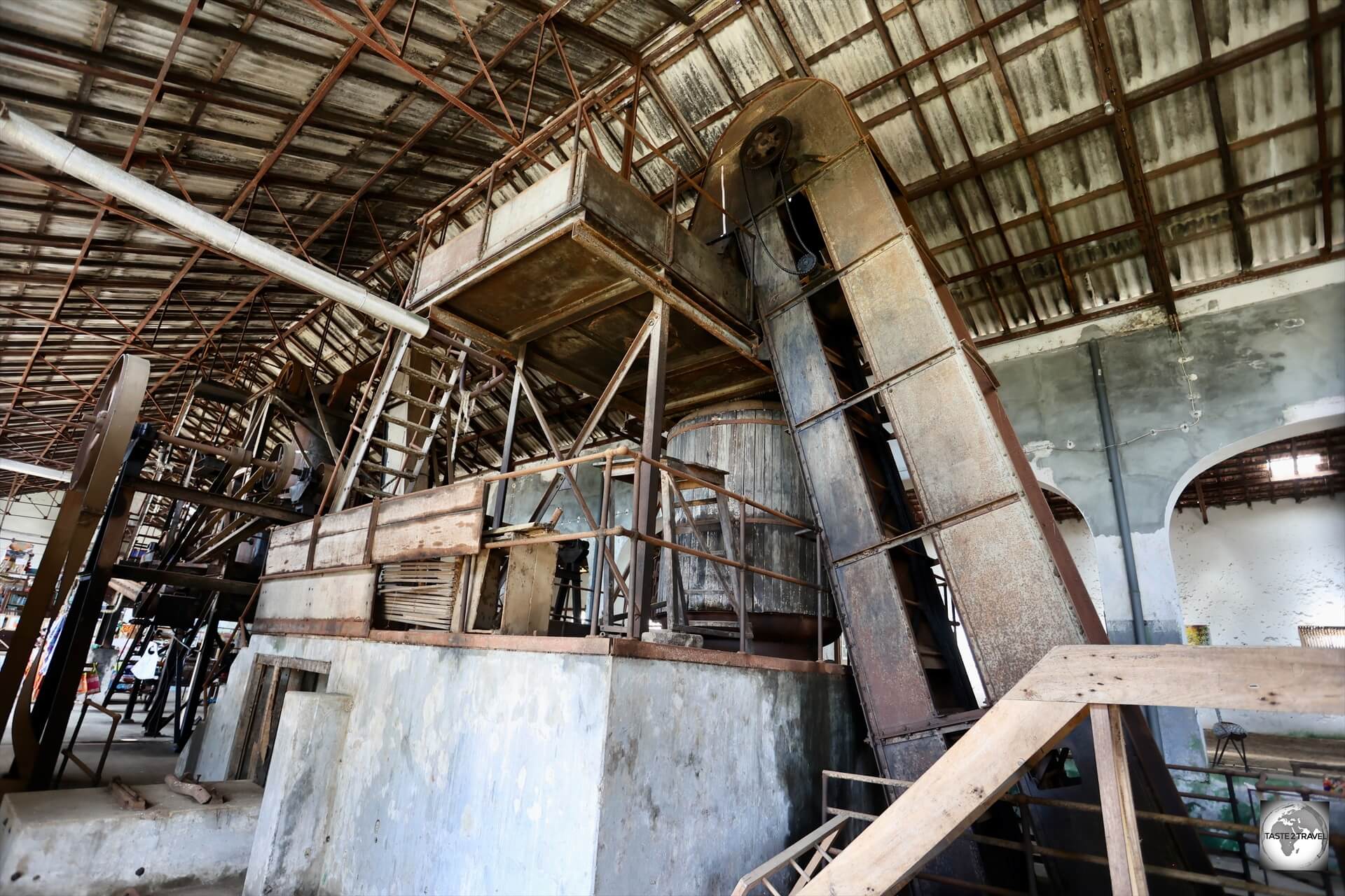 A view of the main production facility at Roça Água Izé, which still houses the old steam-driven equipment.