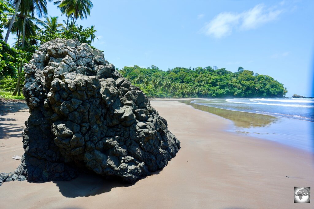 A lonely volcanic boulder is a feature of Praia das Sete Ondas.