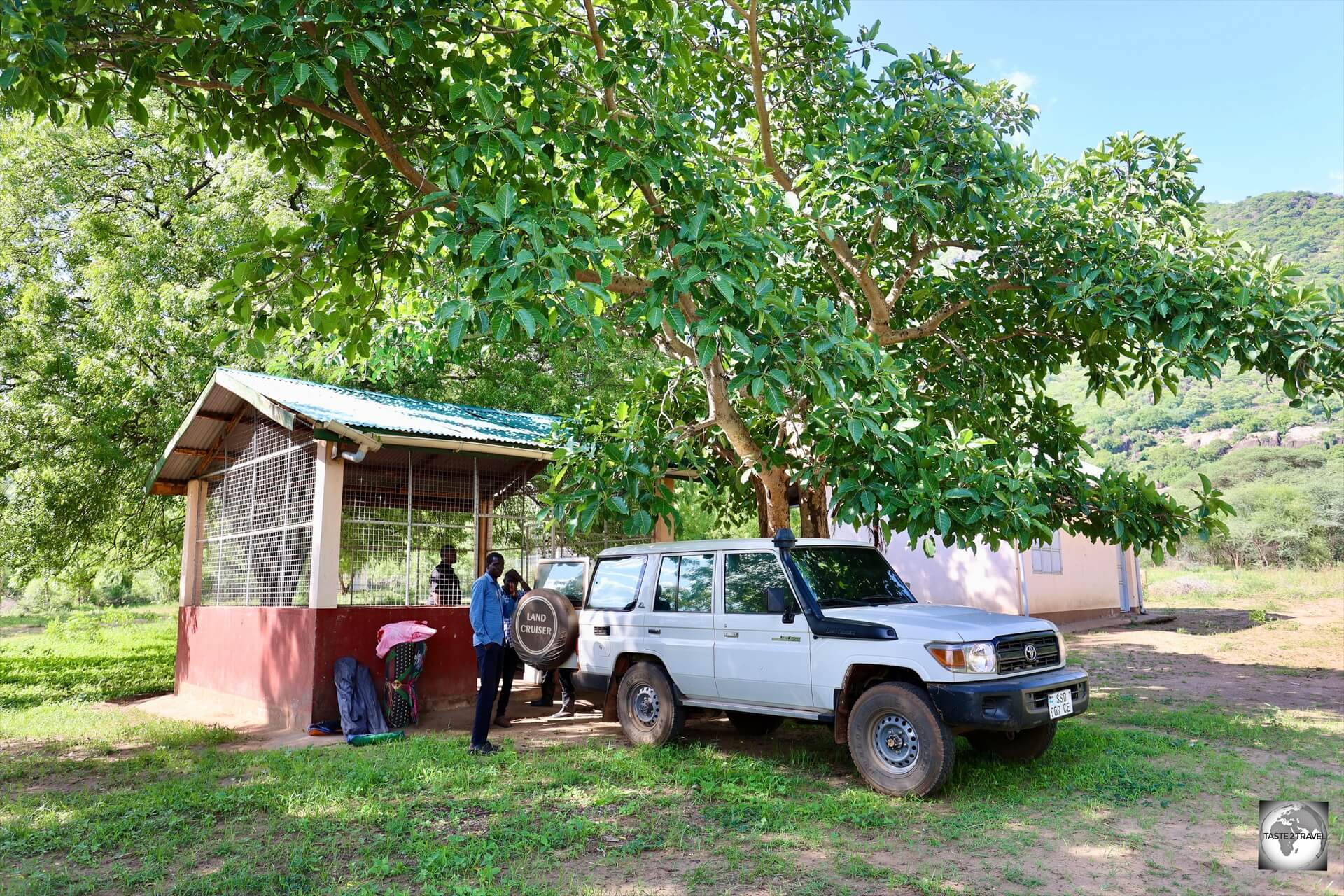 Setting up our campsite, which was in the school yard of Ilieu village. 