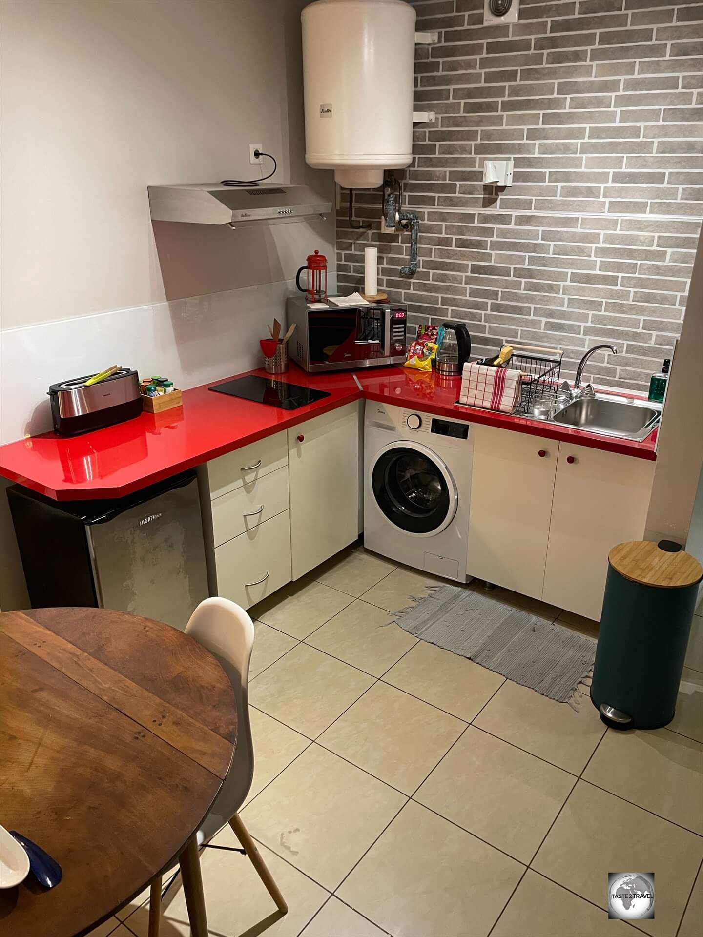 A view of the kitchen, which included a washing machine, at Studio Poe Rava in Papeete. 