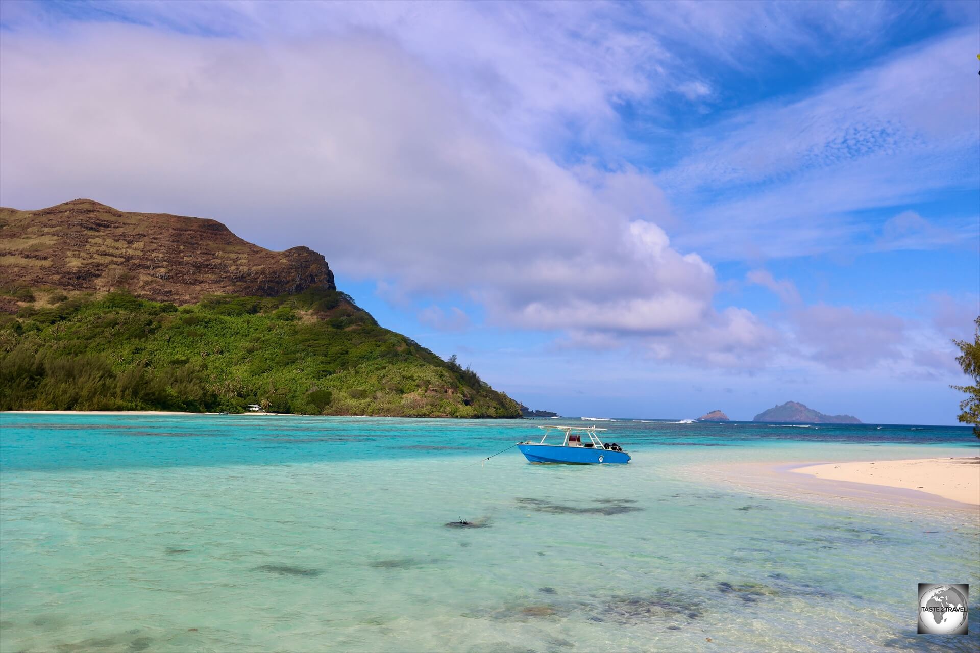 Our boat, from Pension Maro’i, anchored on a beautiful beach at Mekiro Islet with Akamaru Island in the background.