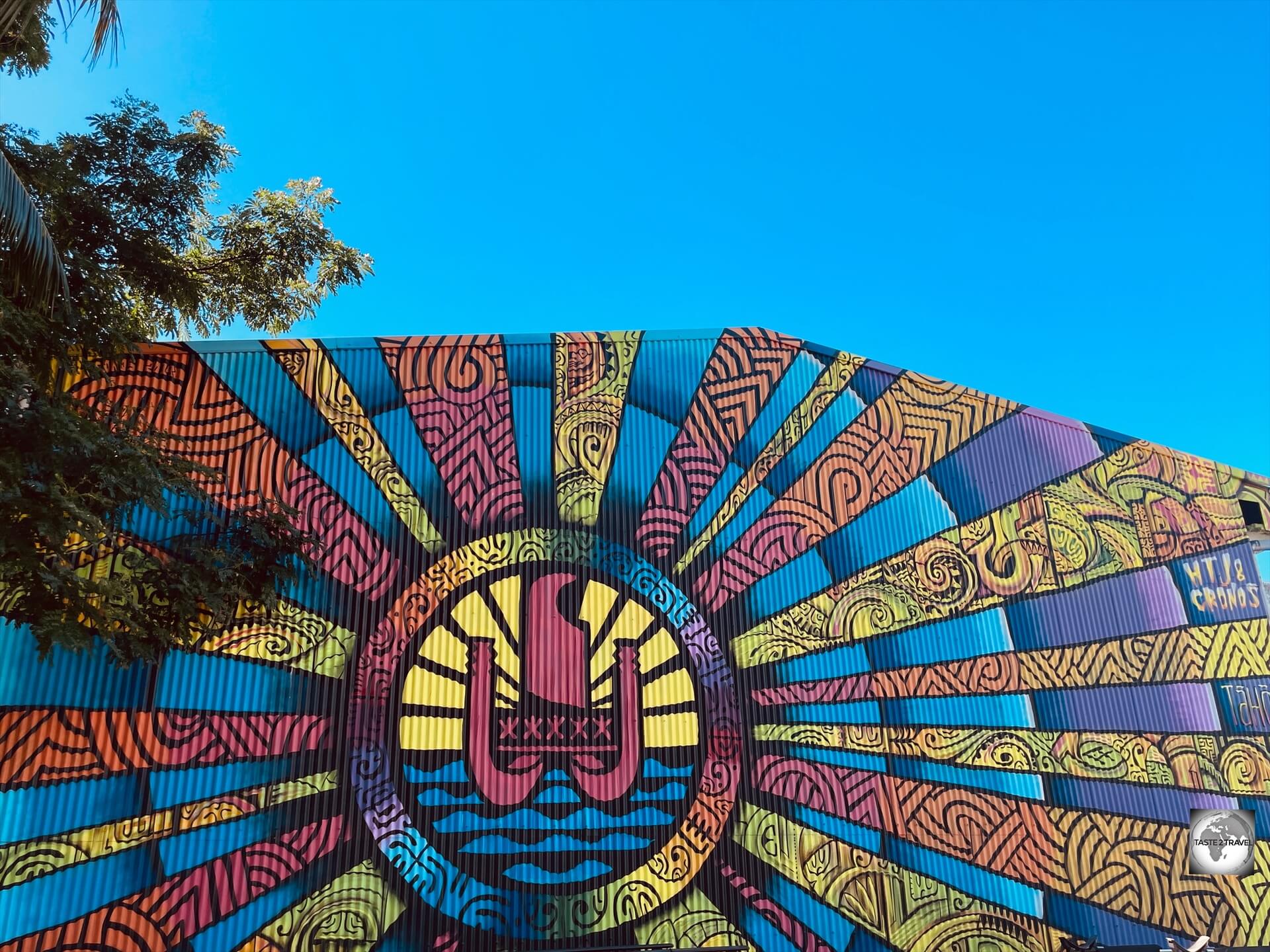 A Polynesian canoe, featured as street art in Papeete.