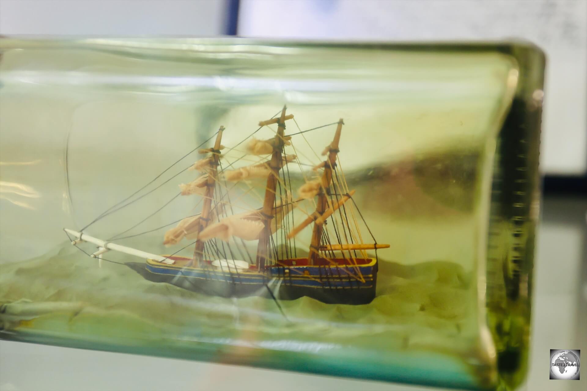 A miniature model of the HMS Bounty, inside a bottle, at the Pitcairn Museum.