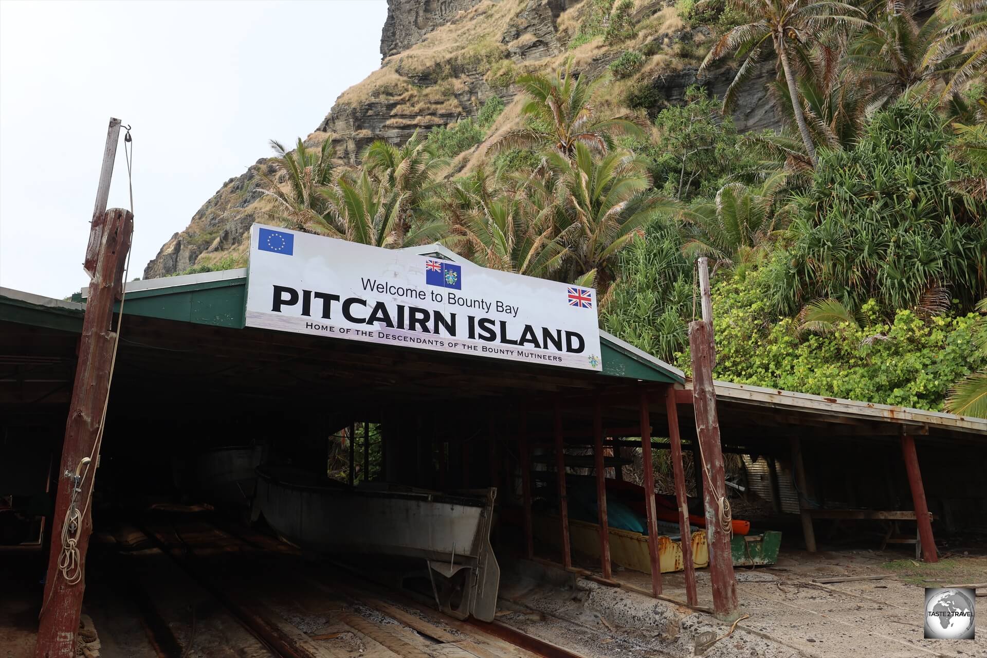 Pitcairn Islands Travel Guide: The much-photographed longboat shed at Bounty Bay. 