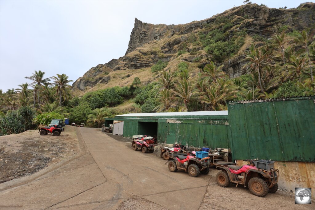 Quad bikes, the most popular form of transport on Pitcairn Island, parked at Bounty Bay.