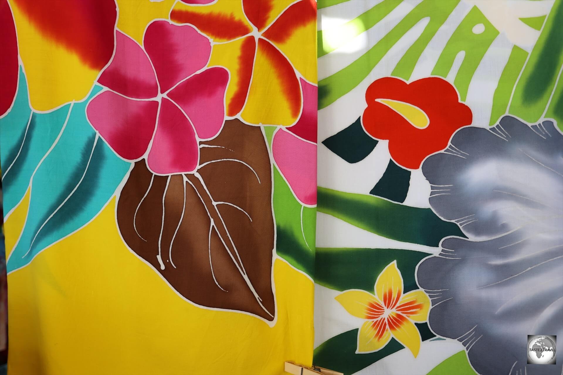 Colourful sarongs for sale in Papeete central market.