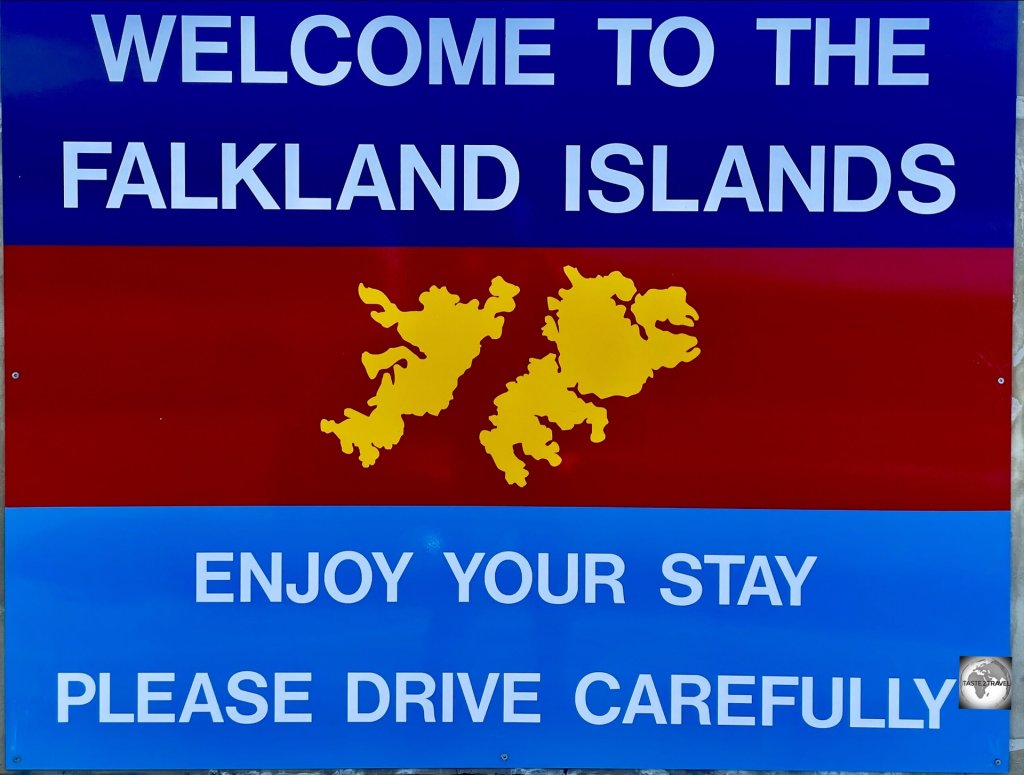 The "Welcome to the Falkland Islands" sign, which is posted outside the Mount Pleasant airport terminal.