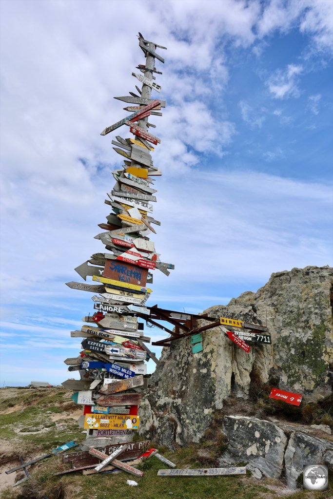 Originally created by military personnel, the Totem Pole indicates distances to various places in the world.