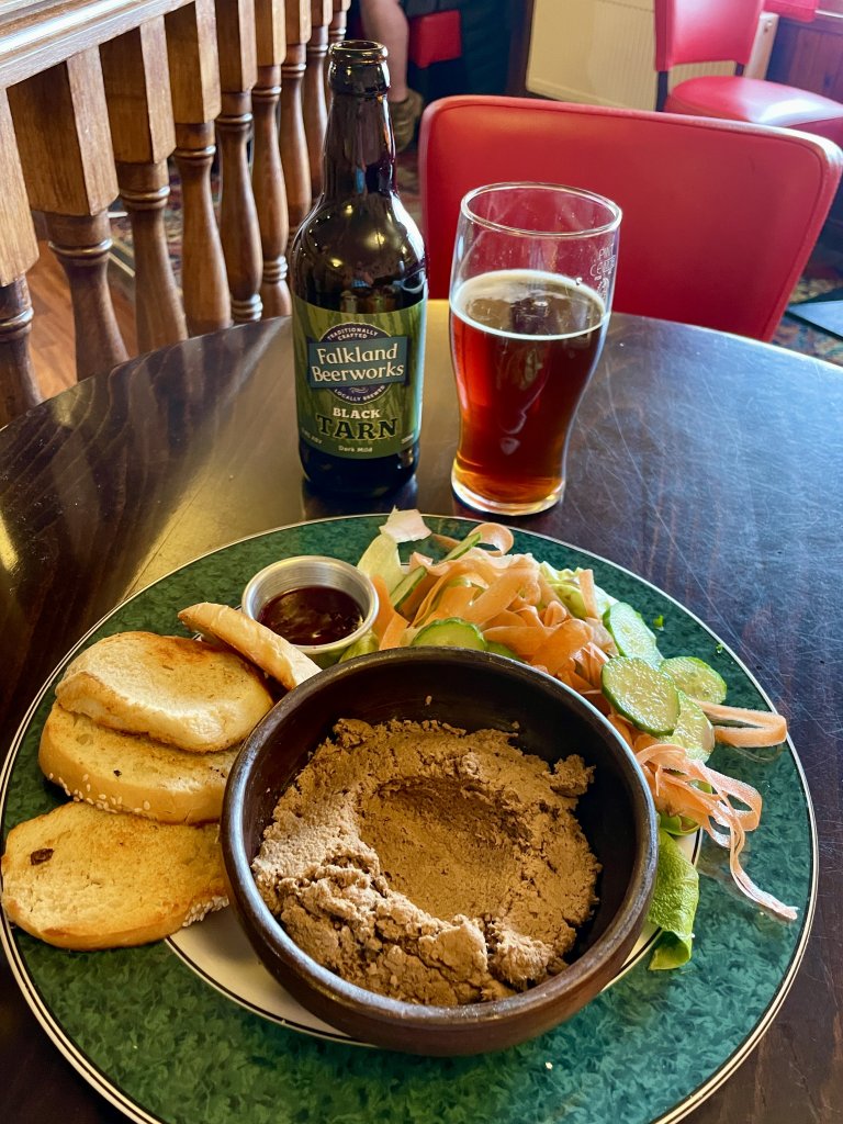 Enjoying a portion of Upland Goose pâté at the Narrows Bar in Stanley.