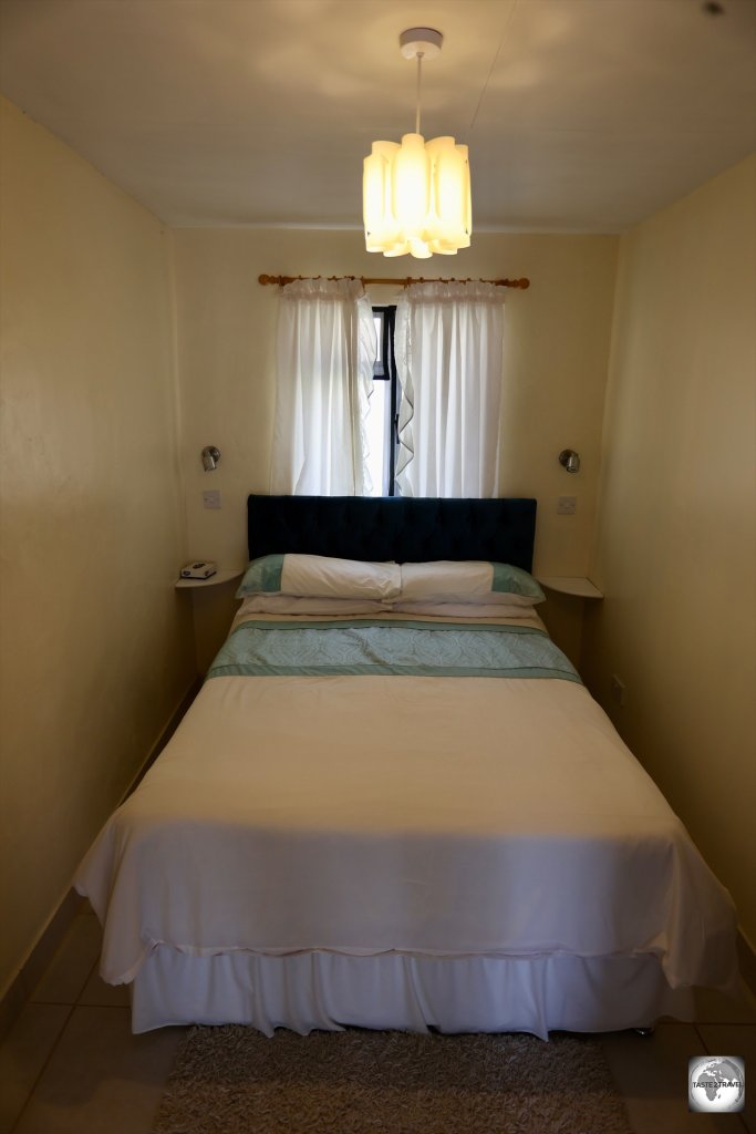 The less-than-spacious bedroom of my Airbnb apartment on Saint Helena.