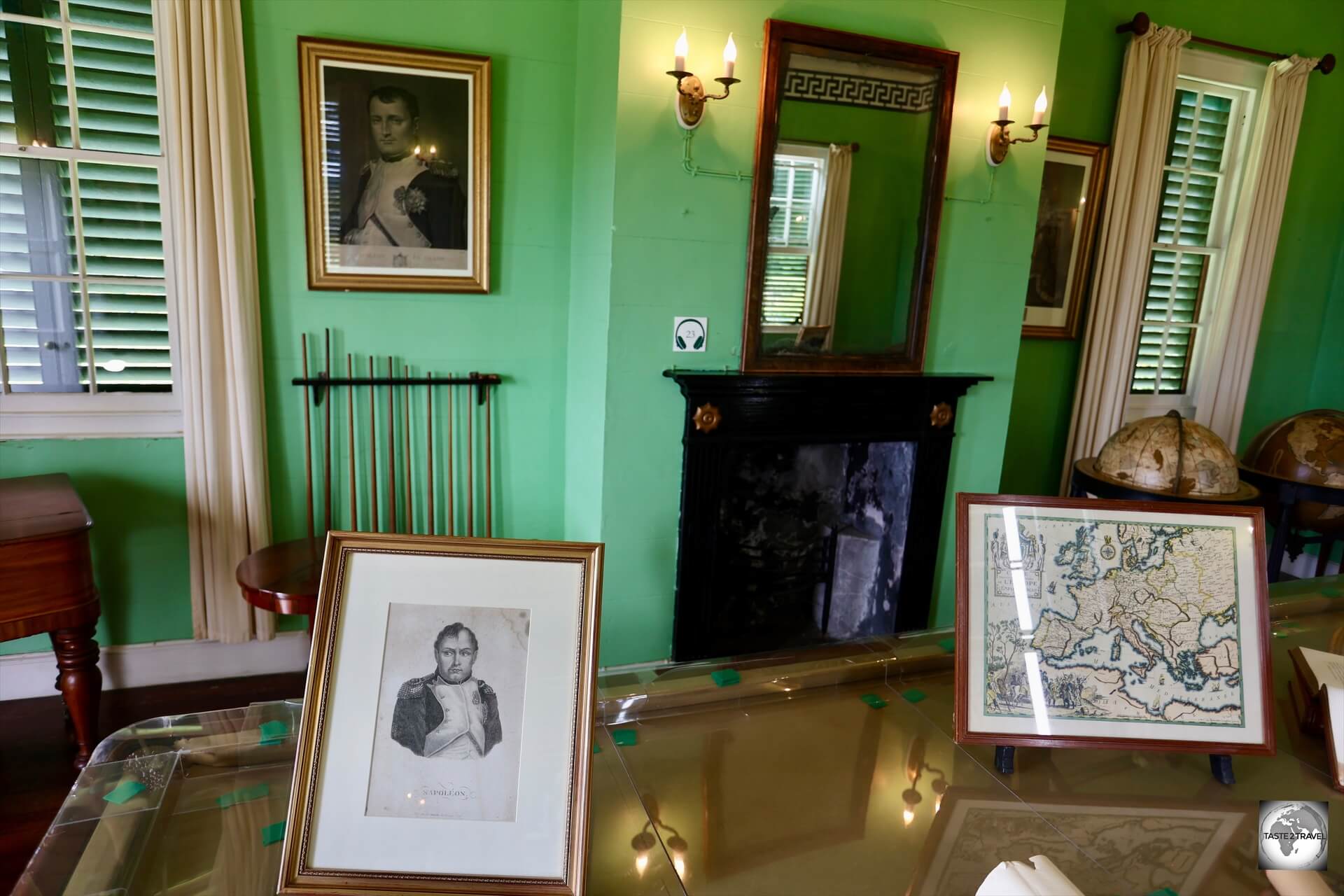 Portraits of Napoleon, and a map of his former empire, in the Billiard/ Map room at Longwood House.