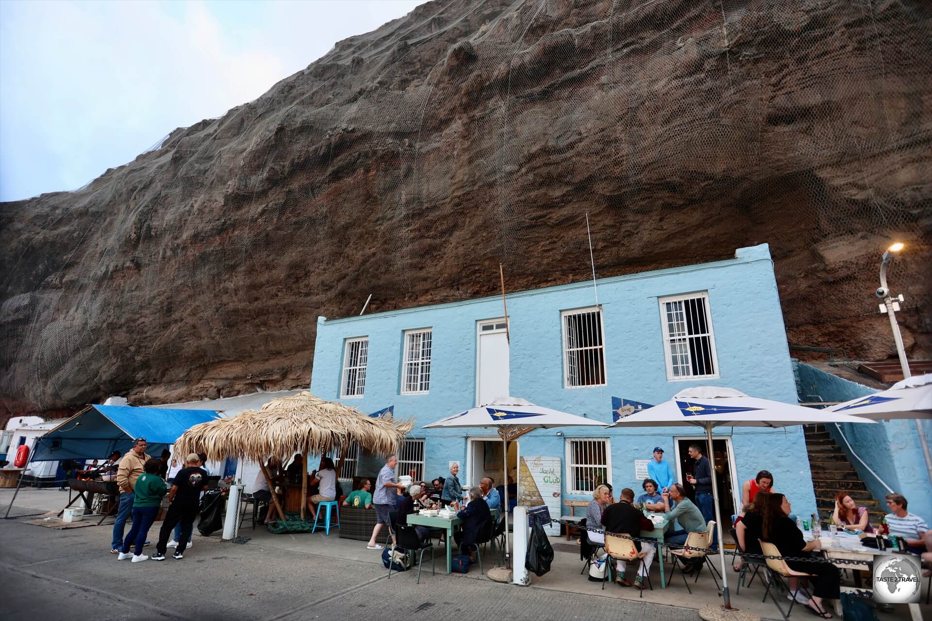 Locals gather outside the Saint Helena Yacht Club for the Wednesday evening 'Fish fry'.