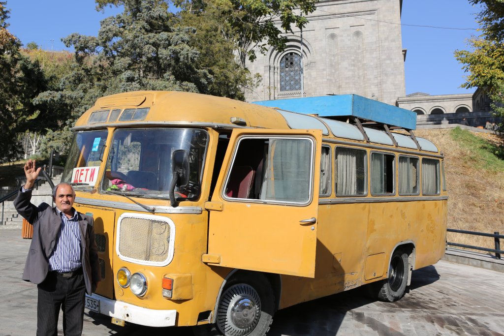 The friendly driver of an excursion bus, outside the Matenadaran Museum in Yerevan.