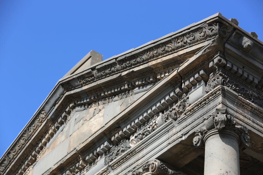 The temple is constructed of locally quarried grey to bluish basalt, assembled without the use of mortar.