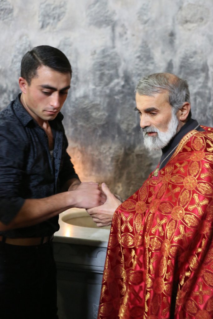 A baptism being performed at Savanavank.