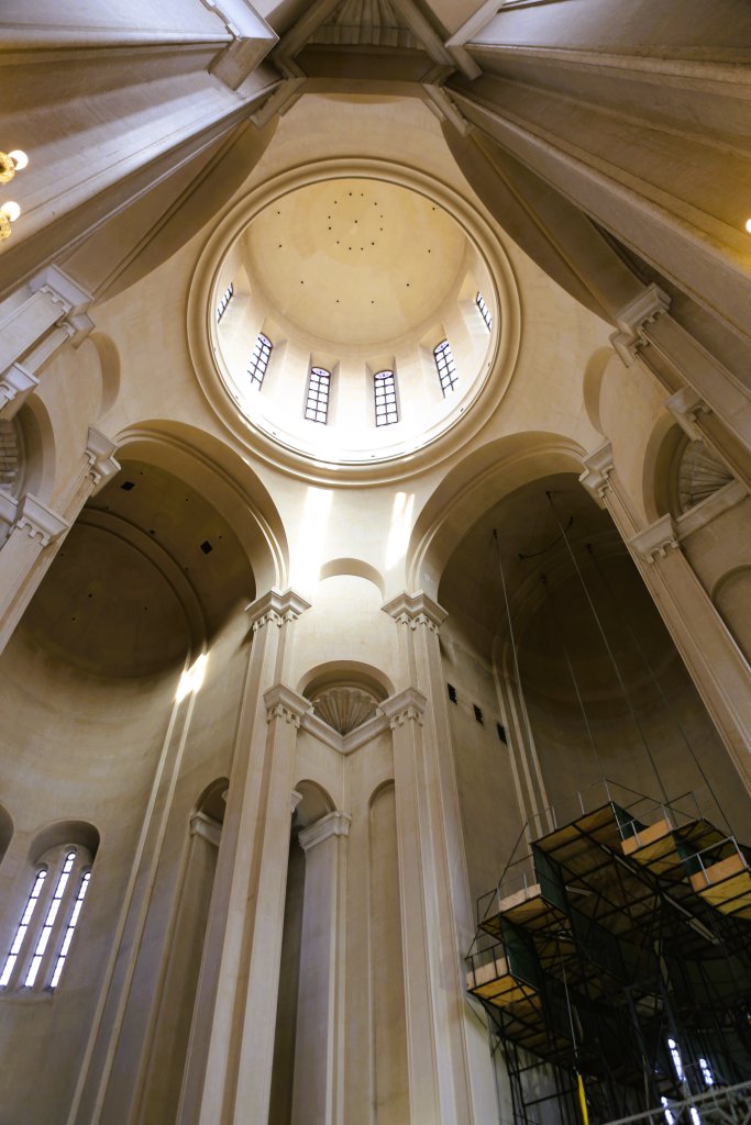 A view of the soaring, modern interior of the Holy Trinity Cathedral of Tbilisi.